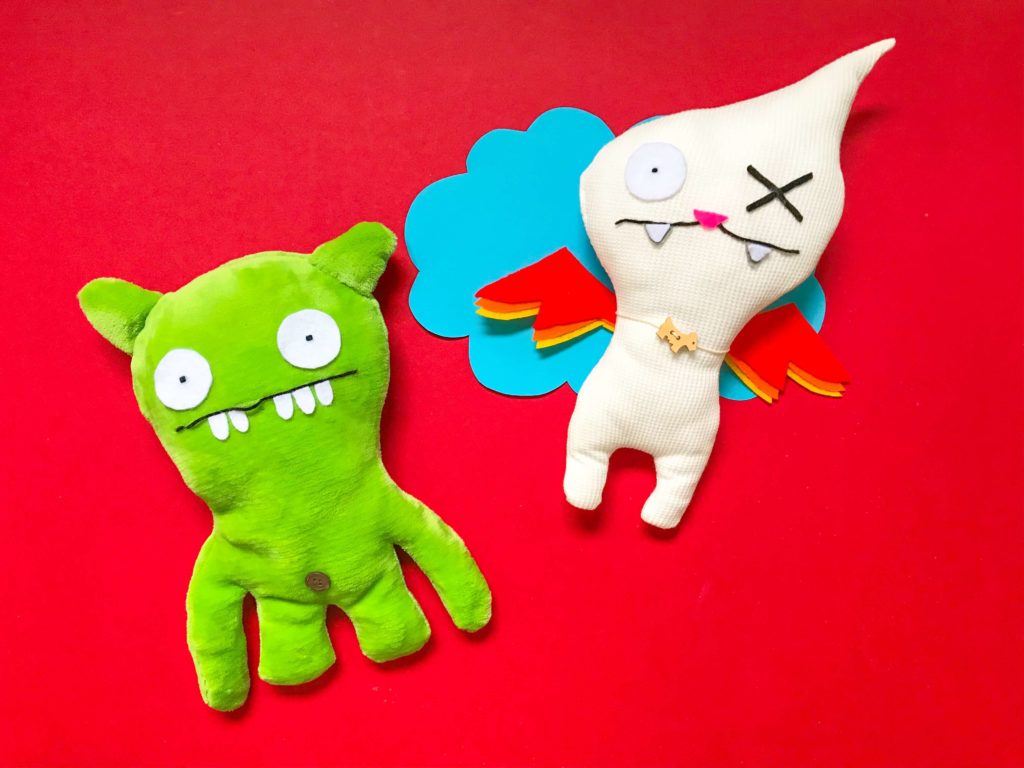 Flying Ugly Doll in Cloud with Green Ugly Doll