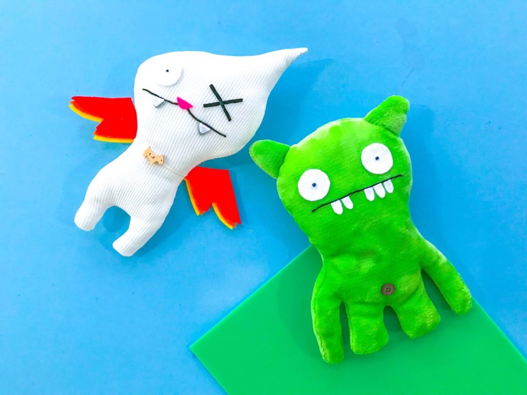 Flying Ugly Doll in Cloud with Green Ugly Doll